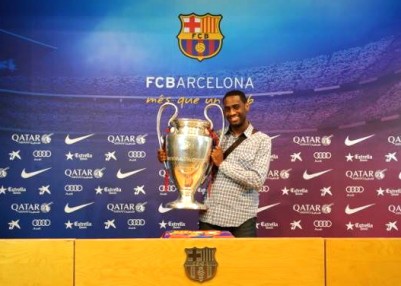 Marlon holding a trophy