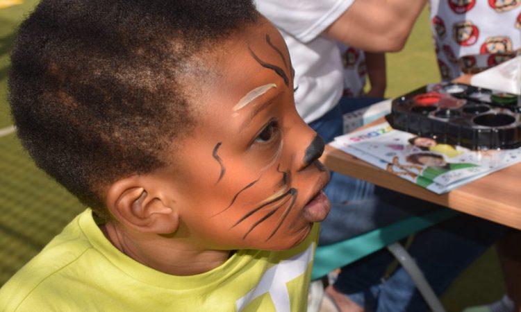 Face painted as a tiger