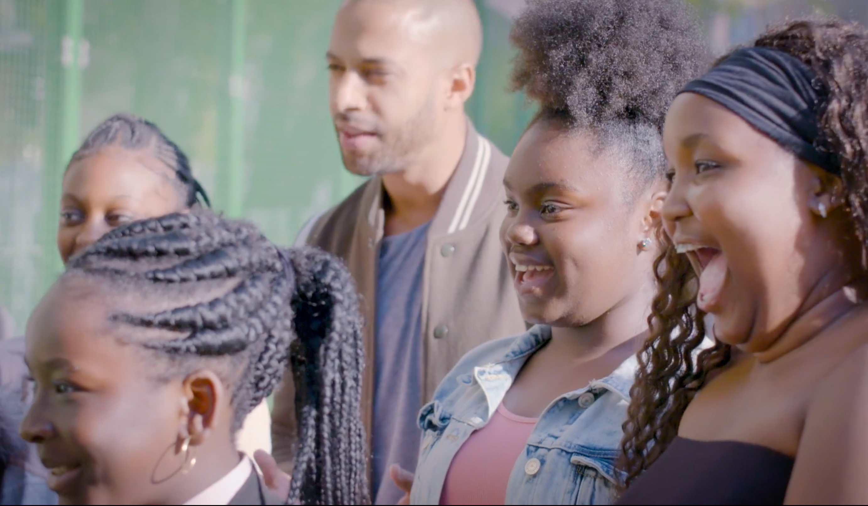 A group of young people laughing