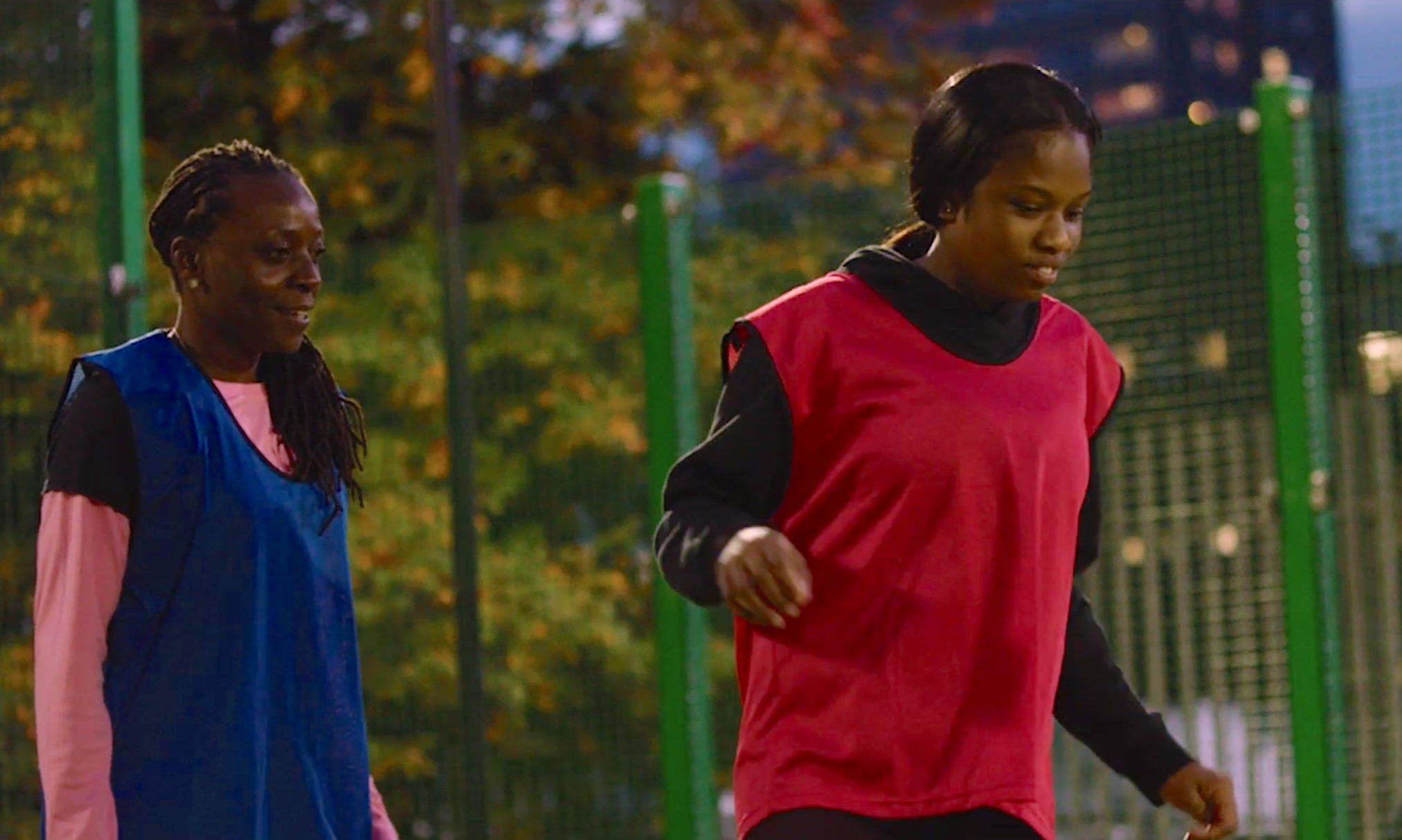 Young women playing football