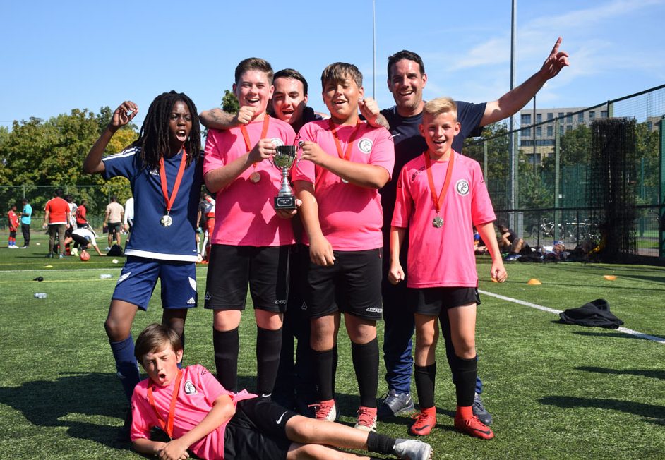 Young people playing football