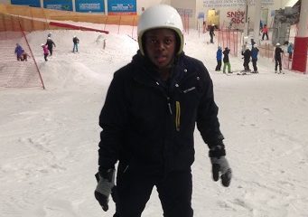 Young person on snowboard