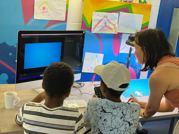 Two of our 8-14's seeing how the camera captures their astronaut and puts into the stop motion animation software so that they can create their film